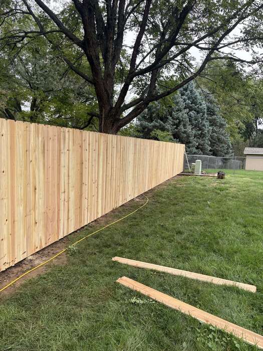 Natural cedar dog-ear picket privacy fence