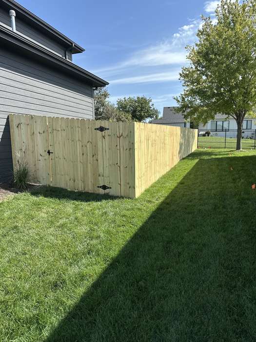 Cedar fence installed in a backyard