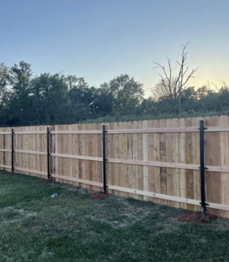Cedar fence on metal posts