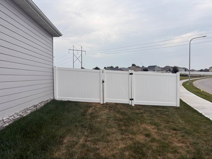 White vinyl fence installation