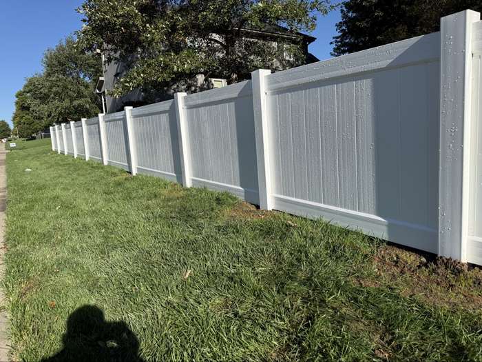White vinyl privacy fence run