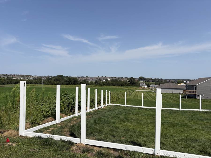 White vinyl fence installation